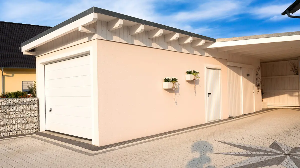 Garage beton avec carport lateral
